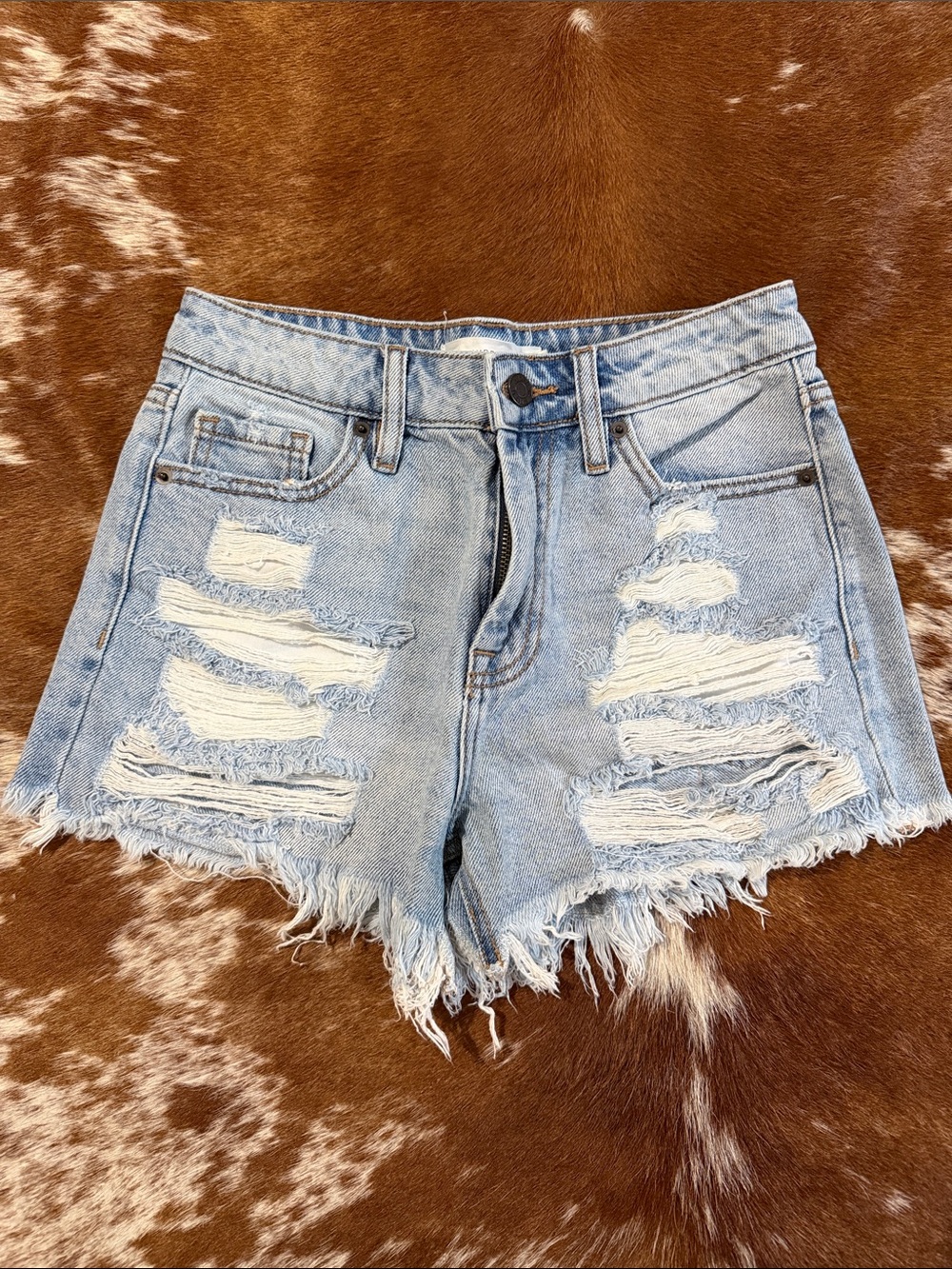 High-Rise Light Blue Distressed Denim Shorts